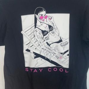 Black t-shirt with graphic design.